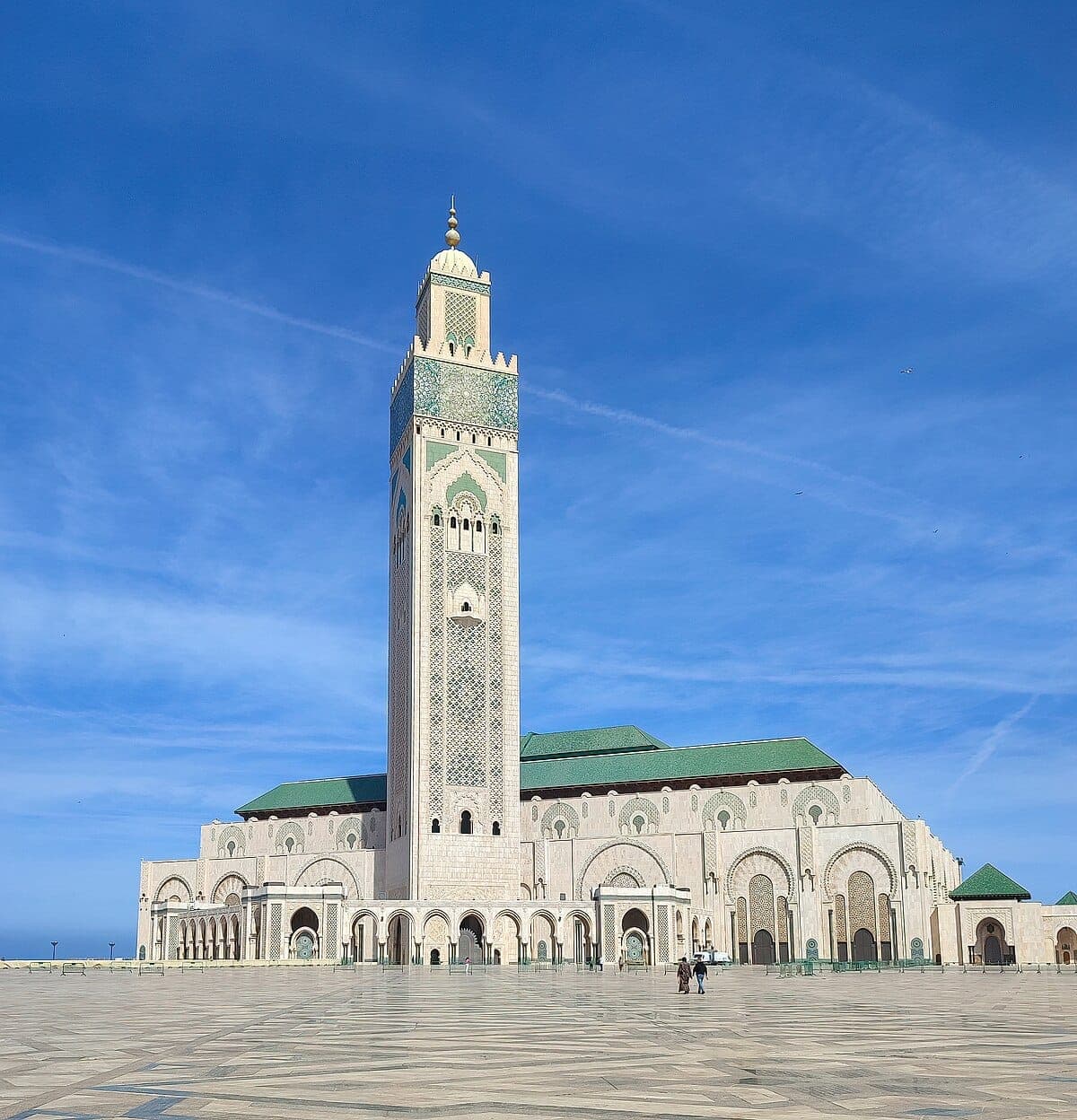 Hassan II Mosque towering above Casablanca, geometric Zellige architecture on the Atlantic coast