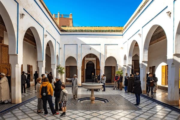 Arched courtyard walkway near Marrakech's Mellah, evocative of the Slat al-Azama Synagogue precinct