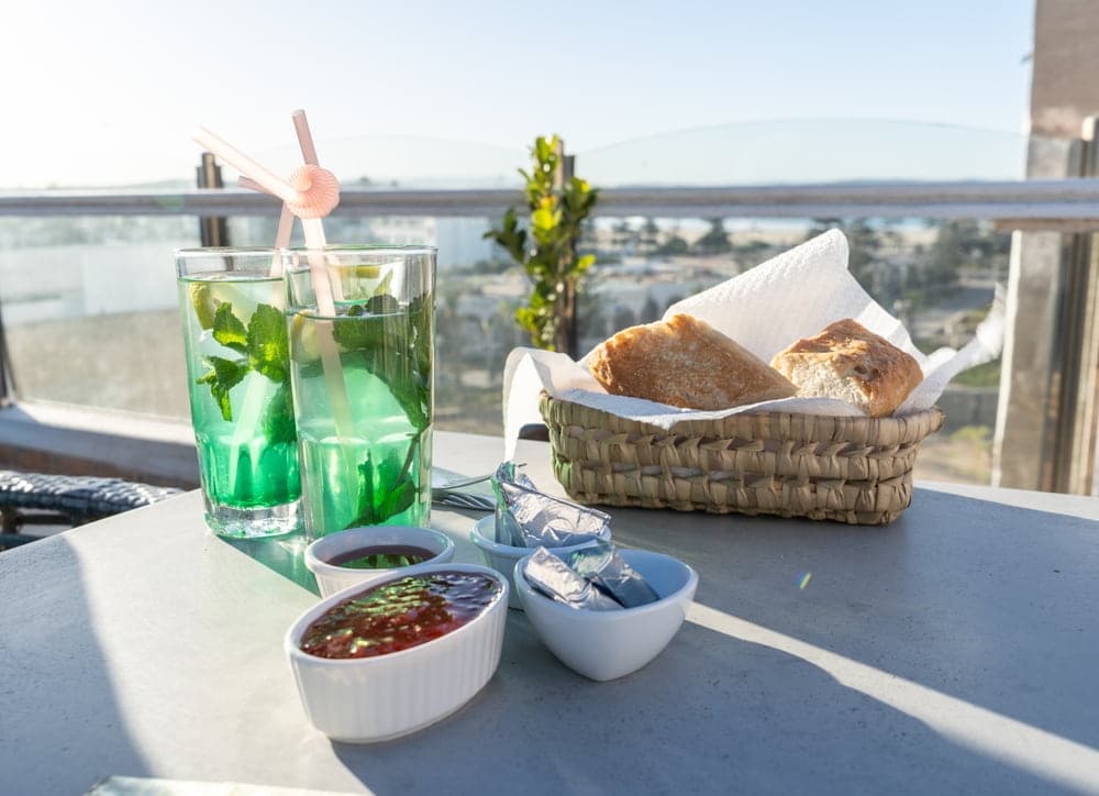 Traditional Moroccan breakfast spread with mint tea and fresh bread served after the balloon flight
