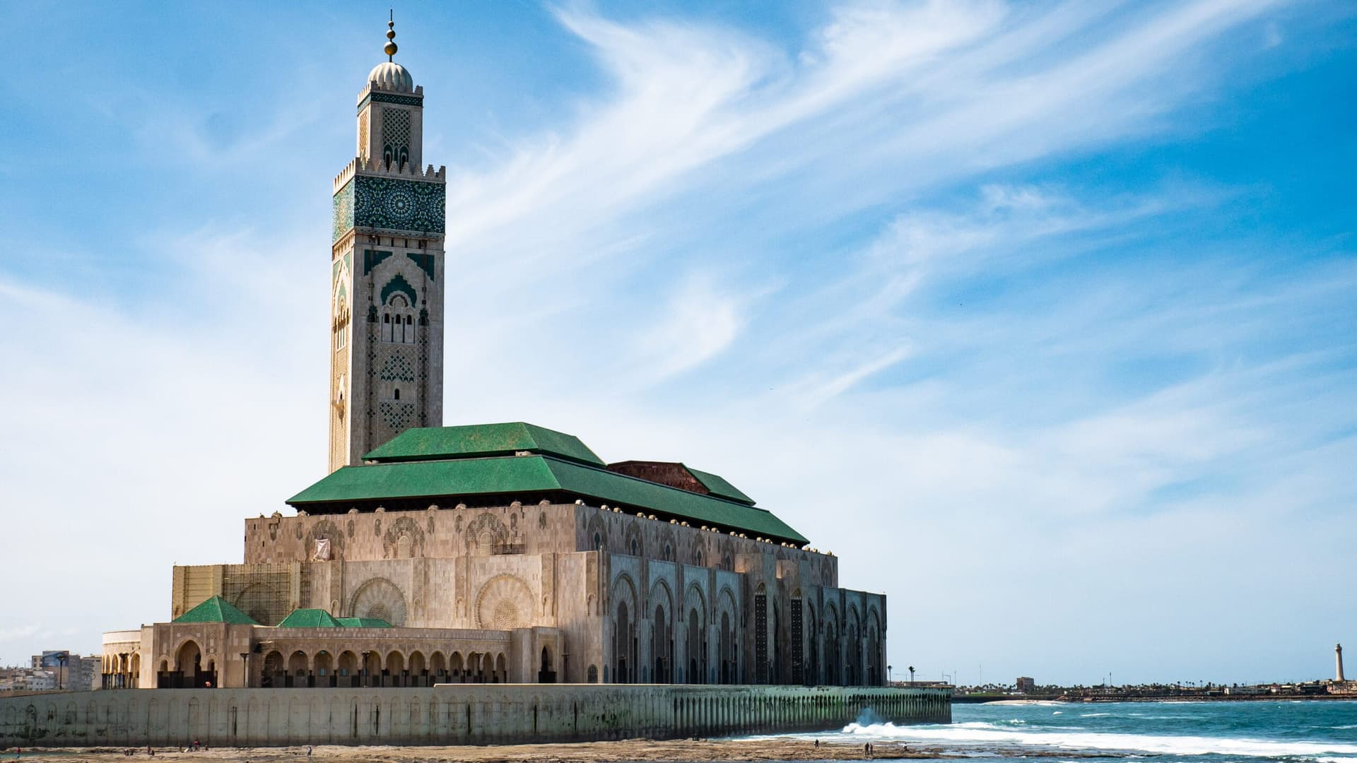 Hassan II Mosque minaret and dome viewed from the Atlantic coastline, Casablanca Morocco