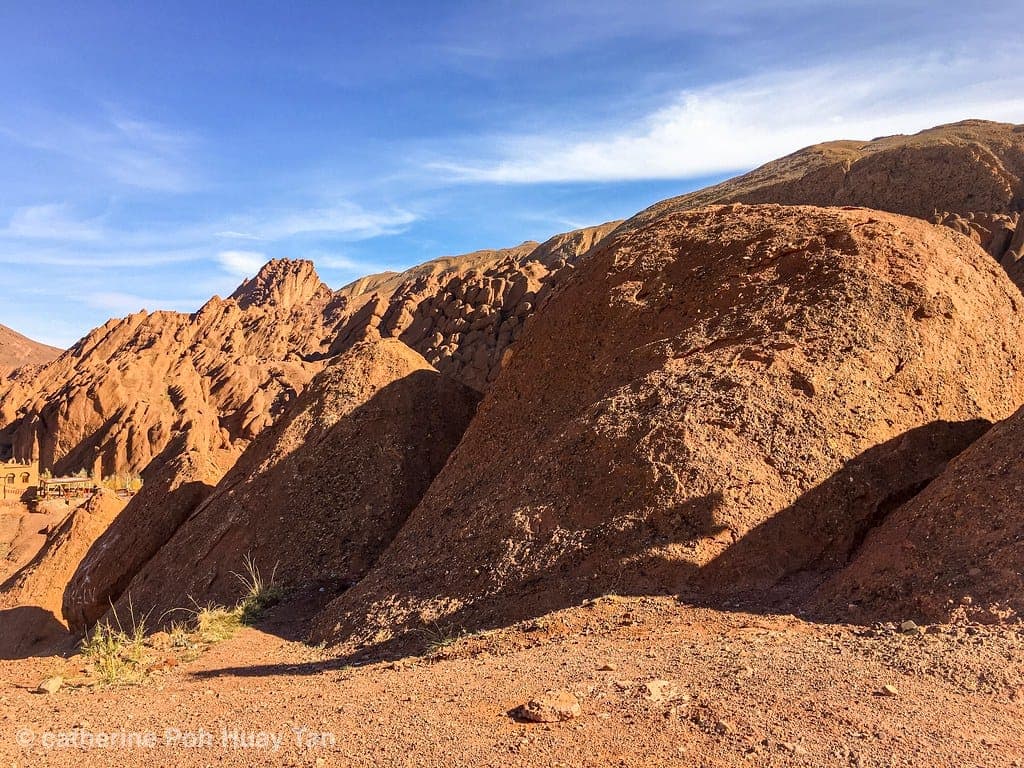 Boumalne Dadès town nestled among red rock cliffs in Morocco's Dadès Valley