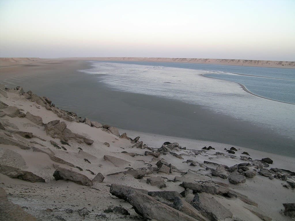 Rocky shoreline of the Dakhla lagoon near where boat trips visit Dragon Island