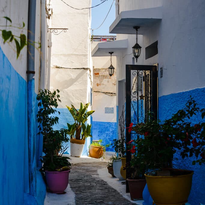 Whitewashed alley evoking Tetouan's UNESCO-listed Andalusian old town, known as the White Dove