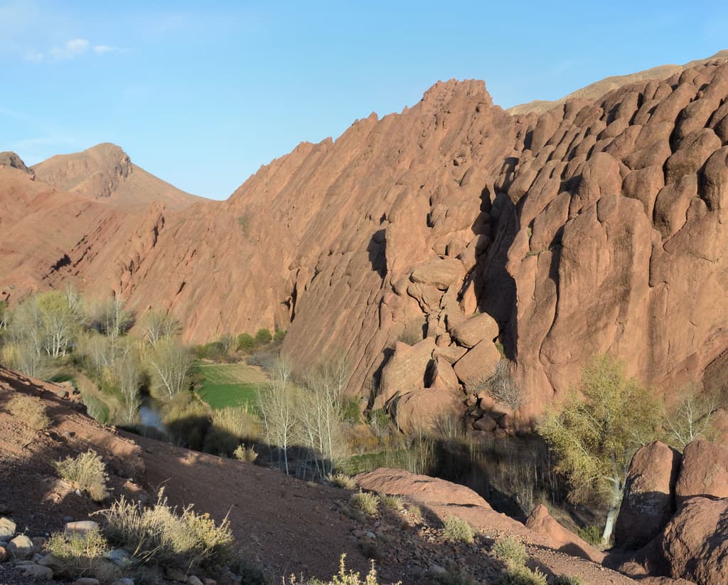 Eroded red rock pinnacles known as the Monkey Fingers in the Dades Valley, Morocco