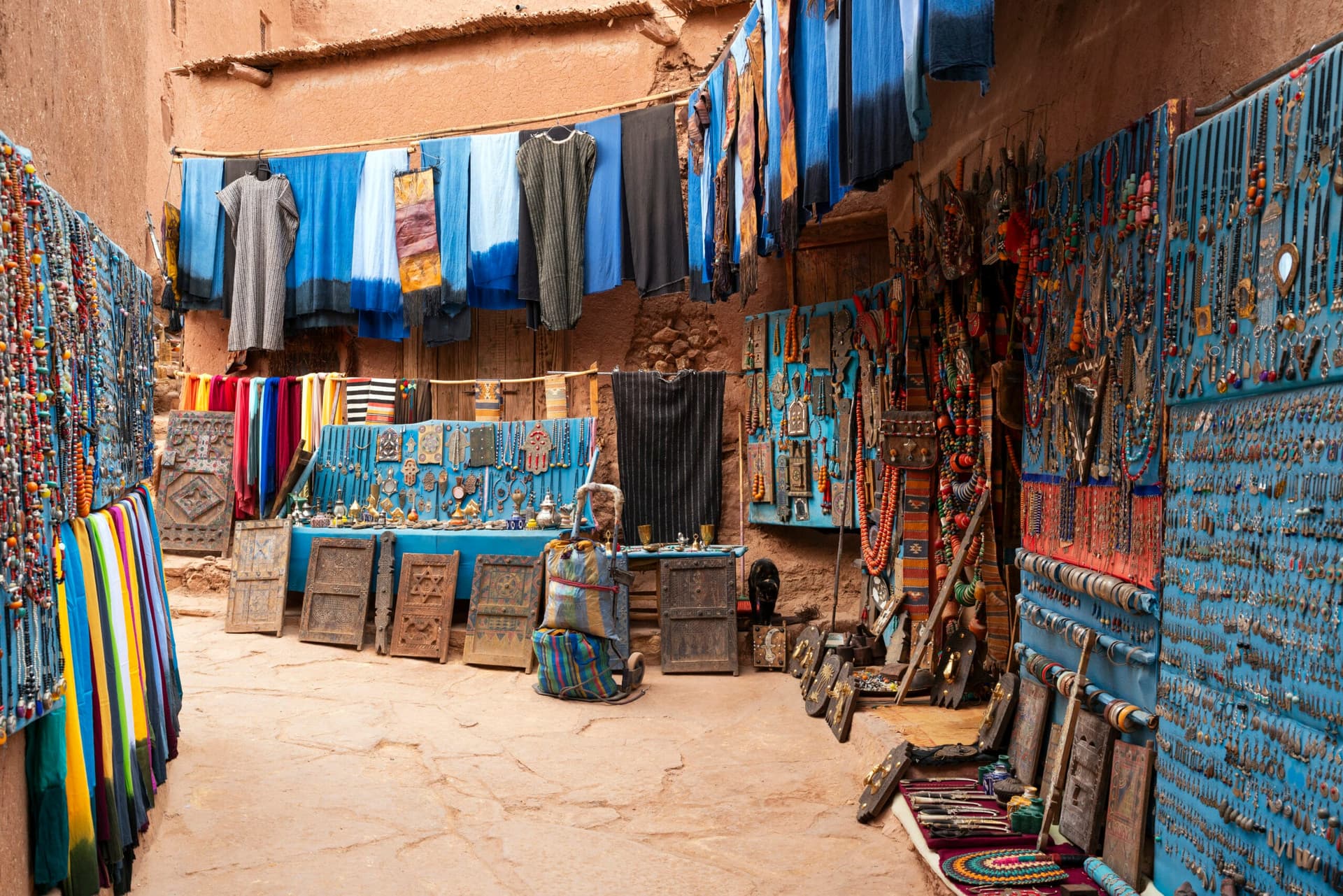 Narrow street lined with earthen houses and family towers, Aït Benhaddou, Morocco
