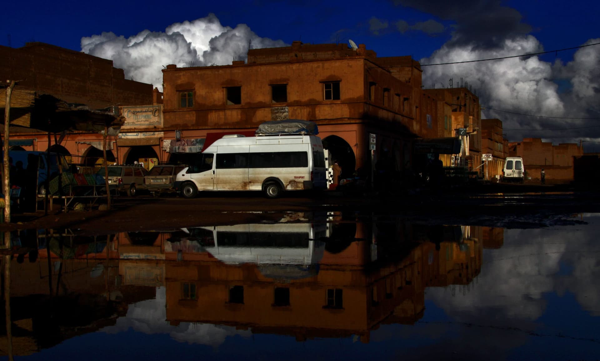 Draa Valley oasis town street near Tagounite in southern Morocco at dusk