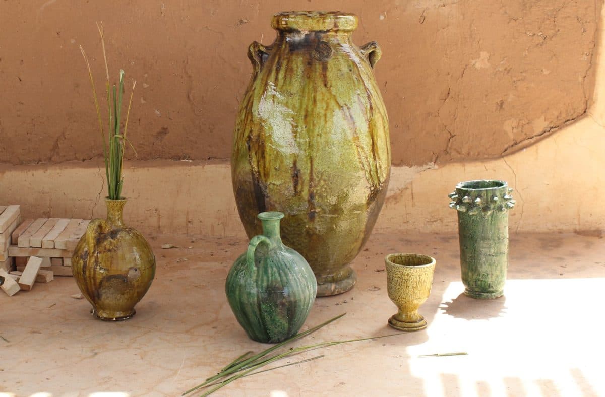 Finished green-glazed ceramic vases from a Tamegroute pottery workshop