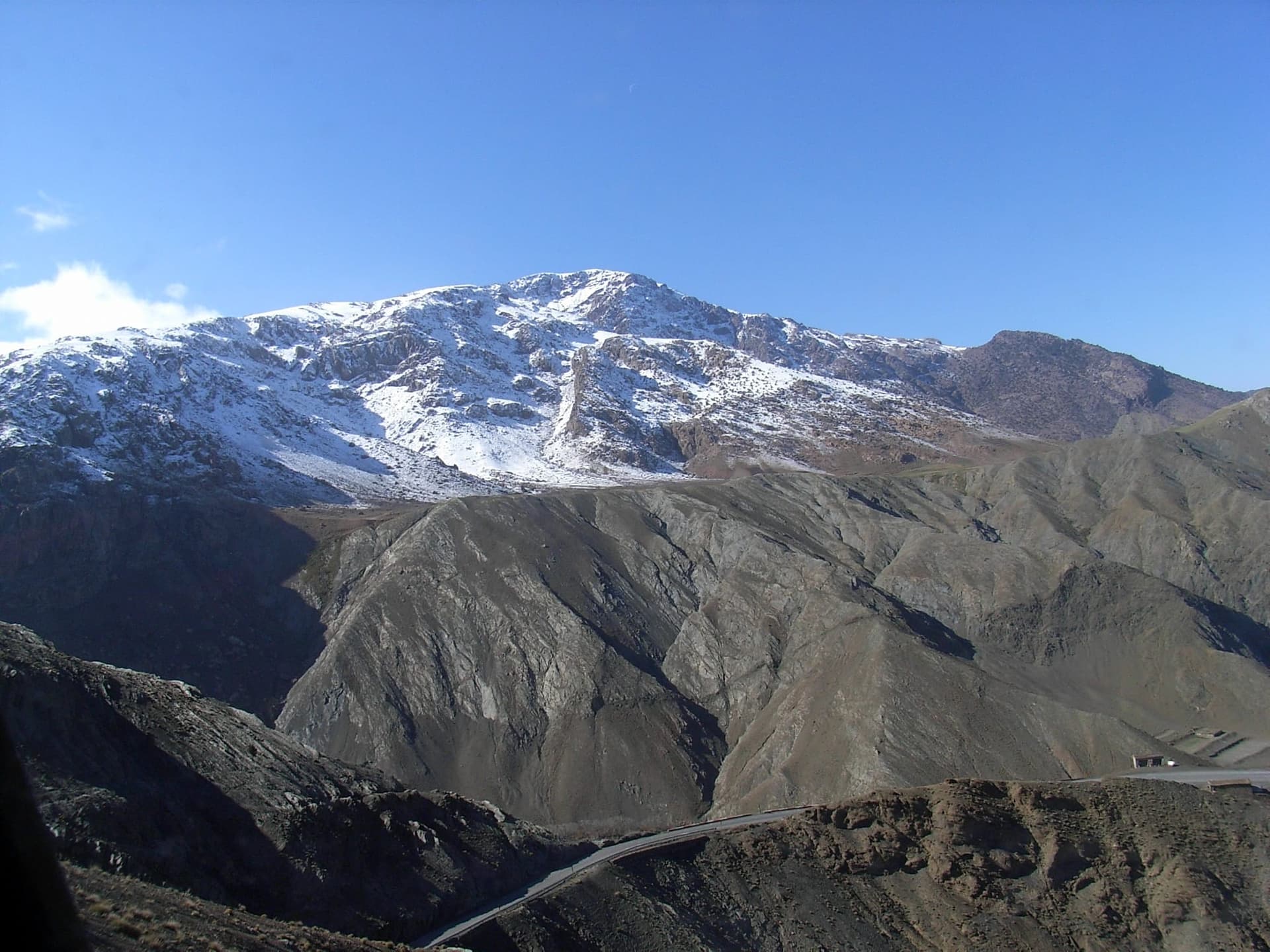 The N9 road through Taddert on the northern ascent of Tizi n Tichka, Morocco