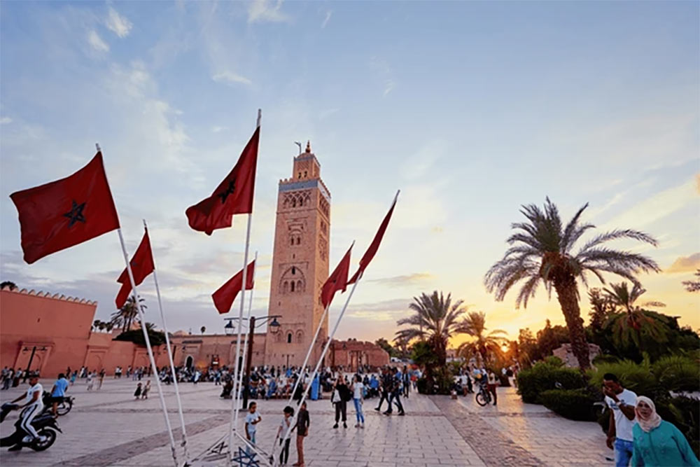 Flag In Front Of Koutoubia Mosque