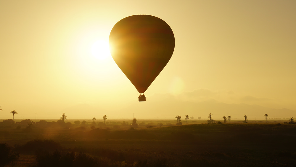 Balloon At Sunrise In Front Of Atlas Mountains